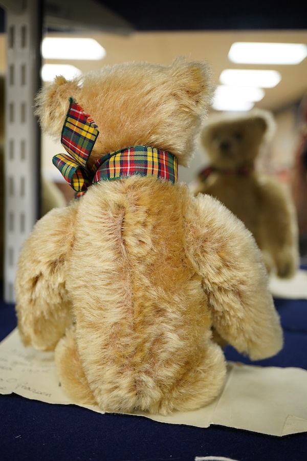 A small Steiff with tartan scarf, c.1908, approx. 26cm long
